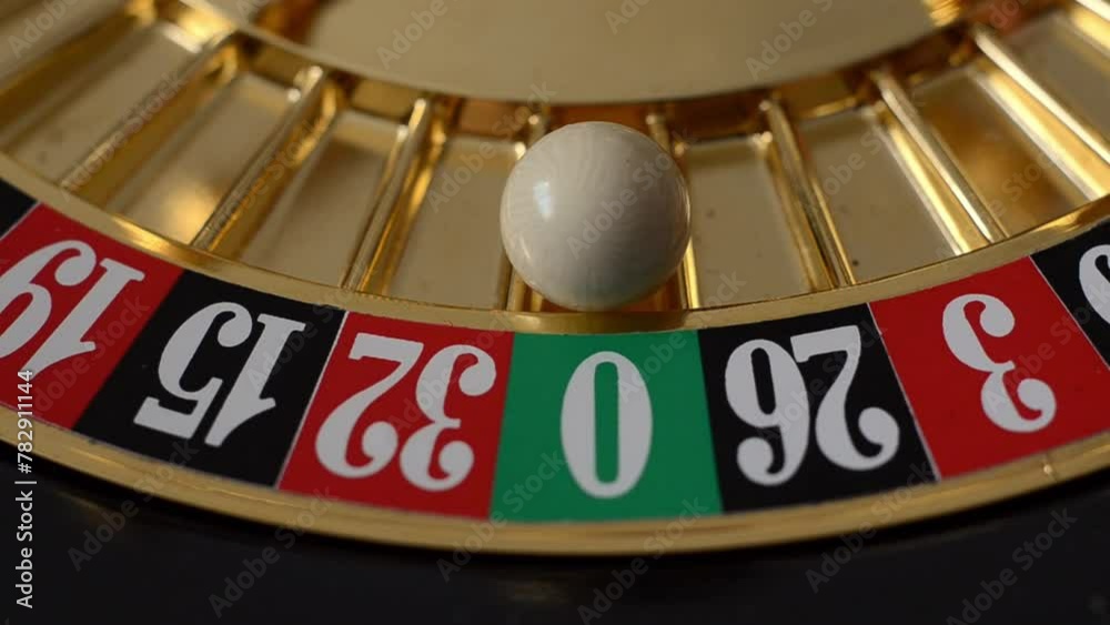Roulette wheel in a casino, number zero won Roulette wheel in a casino, number zero won