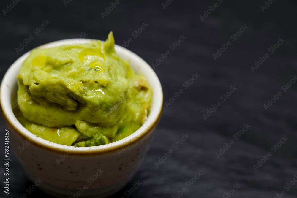 Closeup shot of wasabi in the bowl Closeup shot of wasabi in the bowl