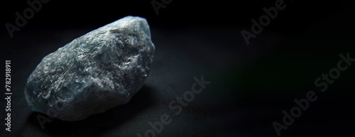 Kalinite is a rare precious natural stone on a black background. AI generated. Header banner mockup with space.