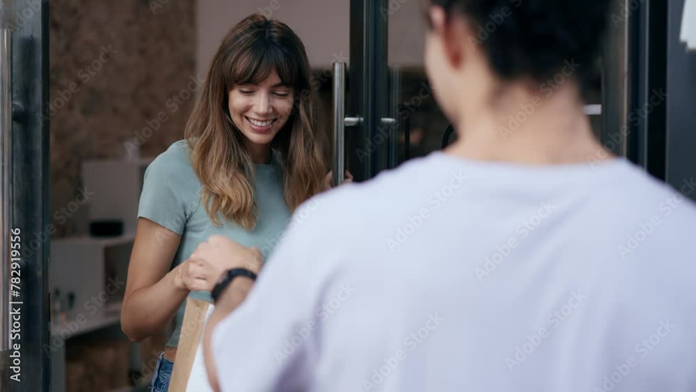 Video of beautiful woman receiving the food order to the delivery man in the office Video of beautiful woman receiving the food order to the delivery man in the office
