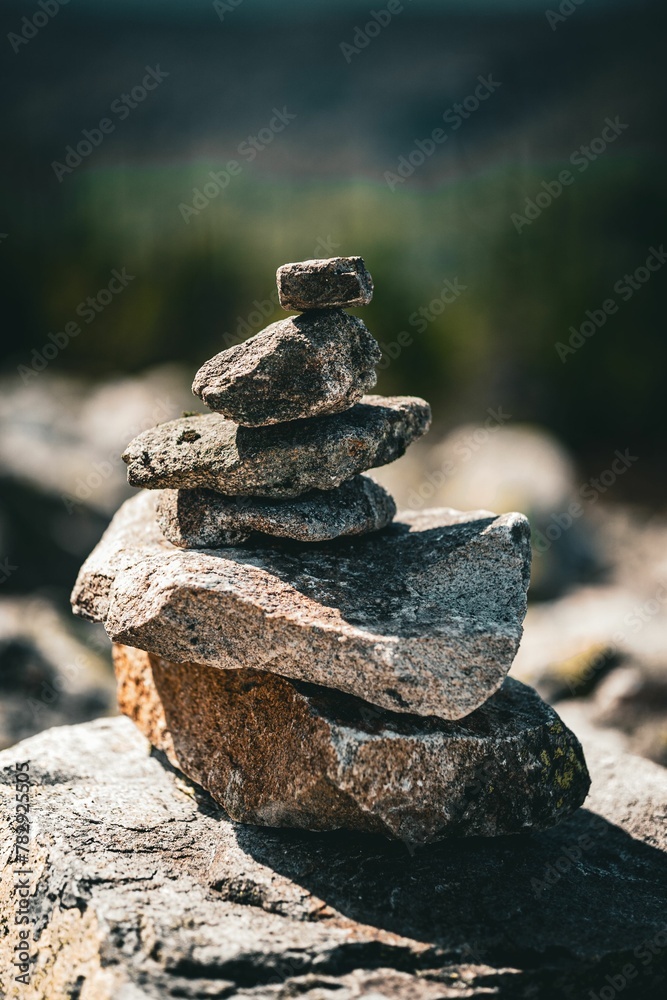 Selective focus shot of stones stacked on top of each other Selective focus shot of stones stacked on top of each other