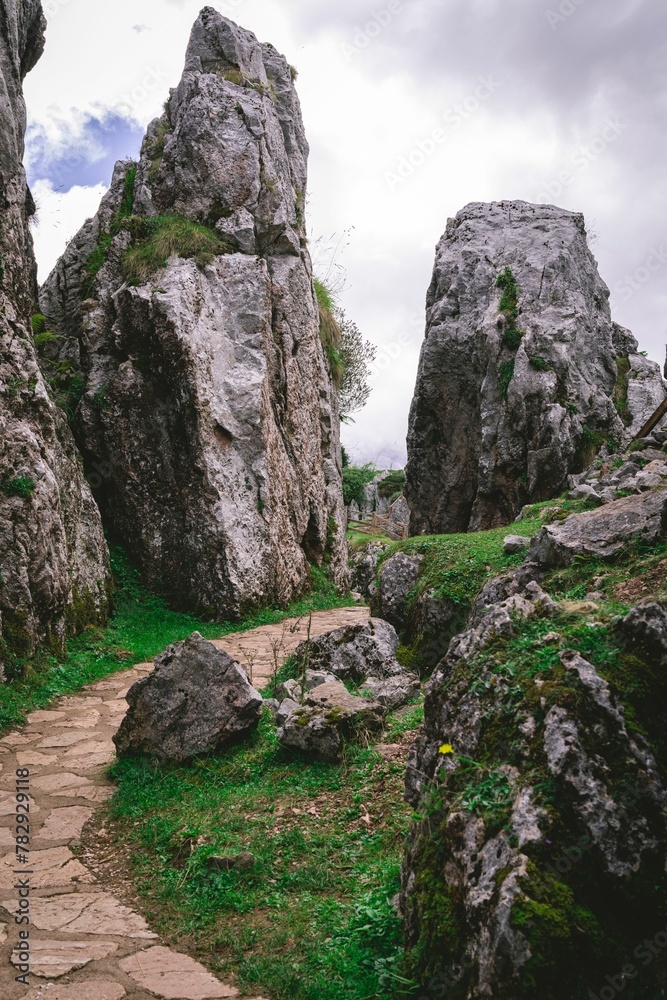 Path surrounded by rock formations