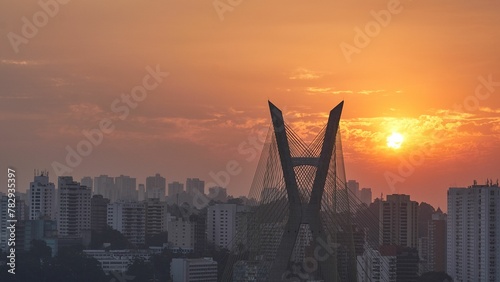 Картината върху платно Octavio Frias de Oliveira bridge in Sao Paulo, Brazil against orange sunset sky