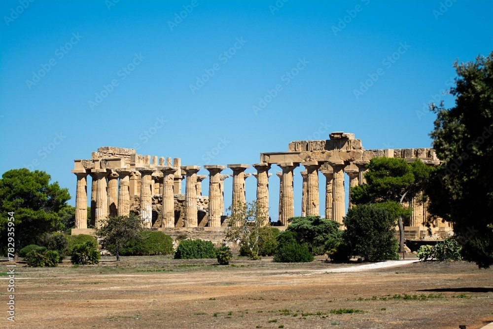 Ancient temple of Hera in Selinunte Italy against the sunny blue sky