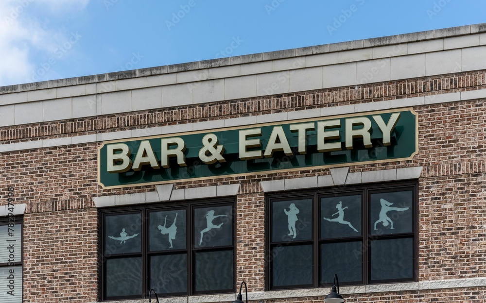 Bar and eatery sign on the building
