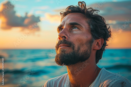 Serene Sunset Contemplation: Bearded Man Enjoying Seaside Dusk