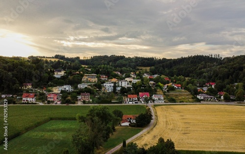 Aerial view to village and farm lands