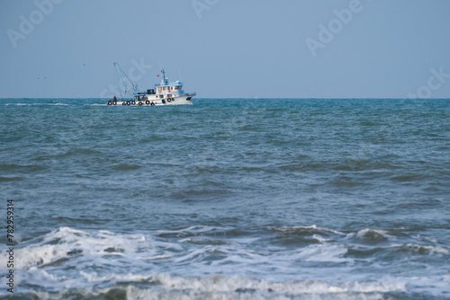 Fishing boat sailing in rough seas © Arzu