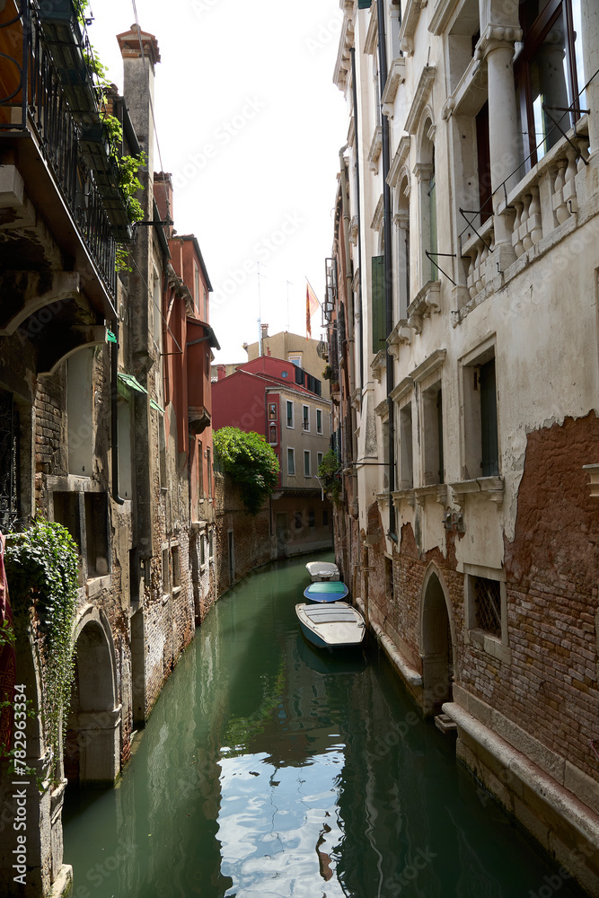 Picturesque view of a canal with ancient architecture on the San Polo river, Venice, Italy
