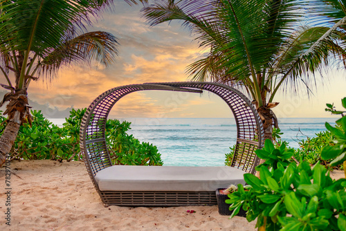 luxury sunbed on the ocean in a picturesque landscape in the Seychelles
