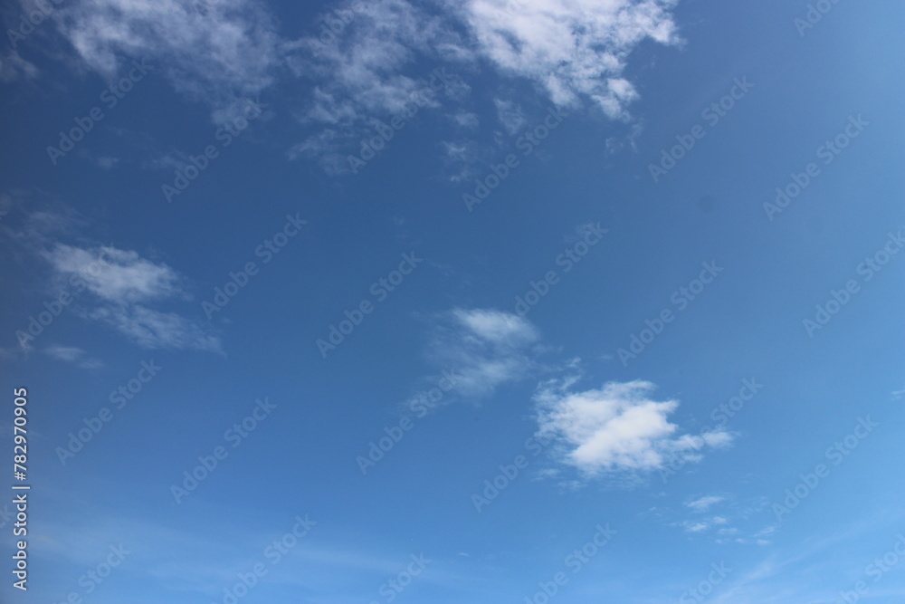 Fototapeta premium blue sky with white, soft clouds