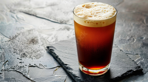 Product photo of nitro cold brew coffee, on slate surface, isolated on white background. studio lighting. photo