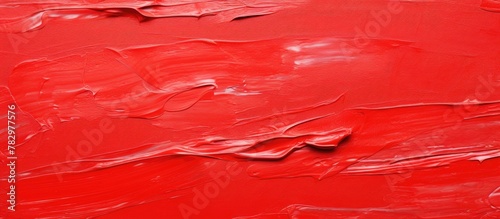 Red paint splattered on canvas