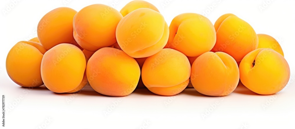 Heap of apricots on white