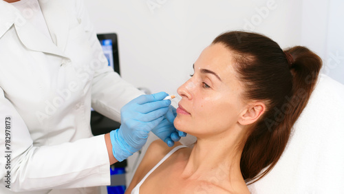 Consultation with a cosmetologist or dermatologist. Before the procedures, the woman is examined by a cosmetologist and receives recommendations on facial cleansing, lifting or injections.