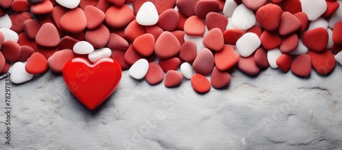 Red heart amid mixed white,...