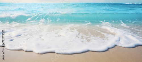 Wave approaching sandy beach
