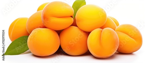 Ripe apricots with leafy top