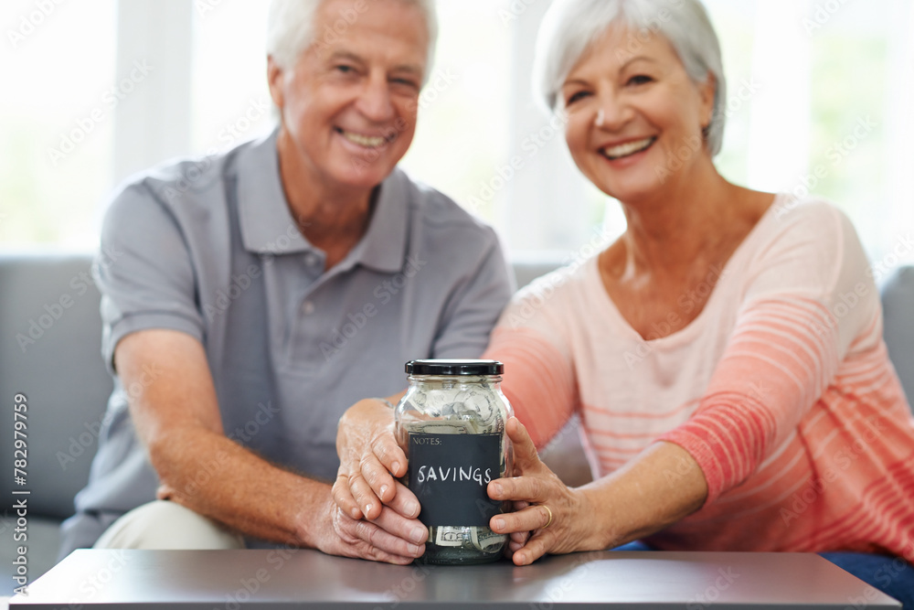 Money, investment and portrait of old couple with savings in jar for retirement, fund or future plan. Senior, finance and cash in piggy bank in home to budget income for increase in financial freedom Money, investment and portrait of old couple with savings in jar for retirement, fund or future plan. Senior, finance and cash in piggy bank in home to budget income for increase in financial freedom
