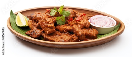 Plate of meat and side sauce
