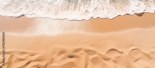 Person surfing on beach