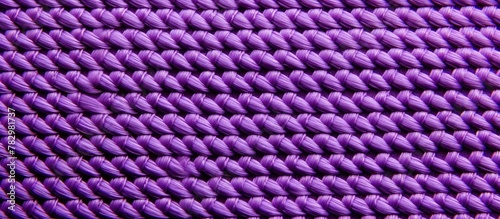 Purple knitted cover on bla...