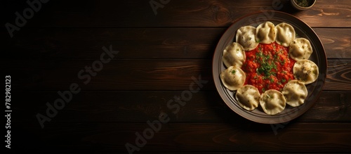 Plate of ravioli and bowl o...