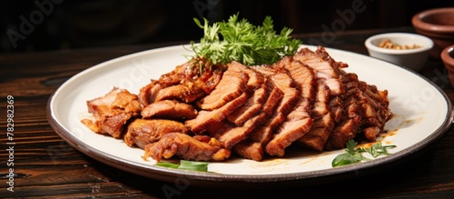 Plate of seasoned meat with...