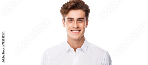 Man in white shirt smiles a...