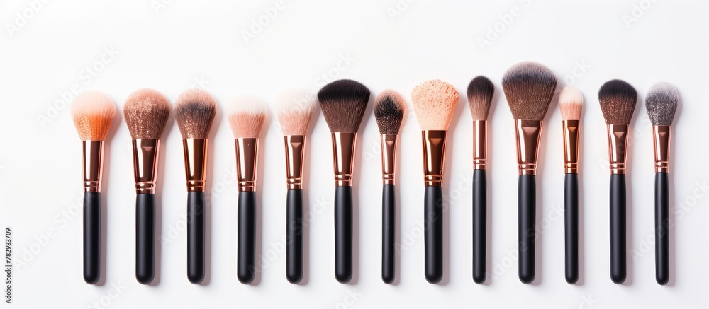 Different makeup brushes on a clean surface Different makeup brushes on a clean surface