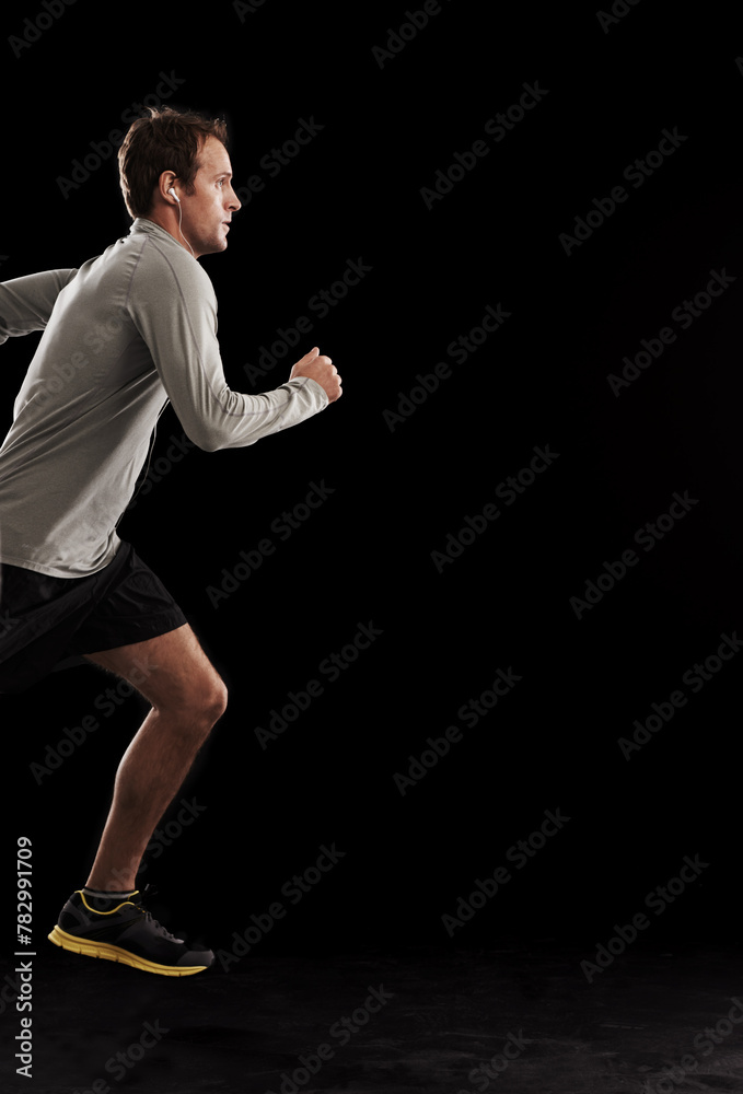 Man, cardio and running exercise in studio for athlete performance or marathon, training or black background. Male person, fitness and sports with mockup space for healthy, workout or competition Man, cardio and running exercise in studio for athlete performance or marathon, training or black background. Male person, fitness and sports with mockup space for healthy, workout or competition