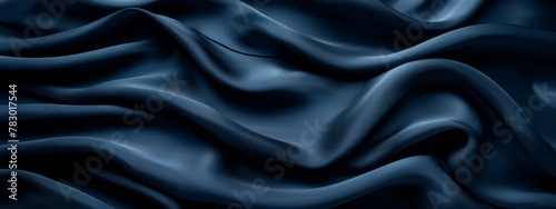 Dark blue silk satin. Soft folds. Fabric. Navy blue luxury background. Space for design. Wavy lines, Banner, Wide, Long, Flat lay, top view table, Beautiful, Elegant, Birthday, Christmas.