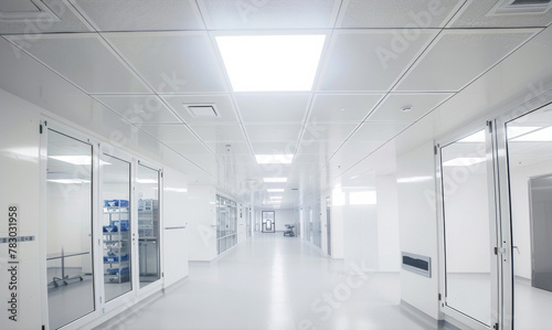 Clean and modern hospital corridor with bright lighting, showcasing organized storage areas and spacious design, ideal for patient flow and healthcare activities