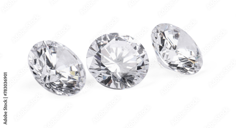 Fototapeta premium Three beautiful shiny diamonds isolated on white