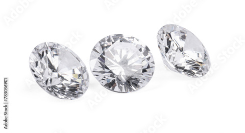 Three beautiful shiny diamonds isolated on white © New Africa