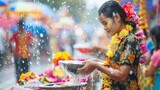 The festive air of Songkran streets alive with the preparation of water bowls and jasmine garlands