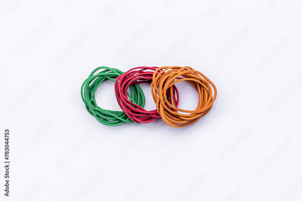 Rubber band binding on isolated white background Rubber band binding on isolated white background