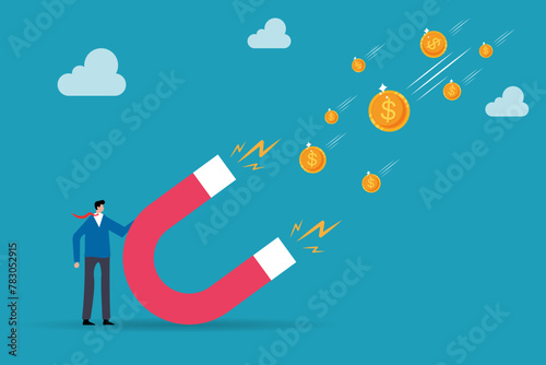 Businessman use large magnet to attract money. business concept.