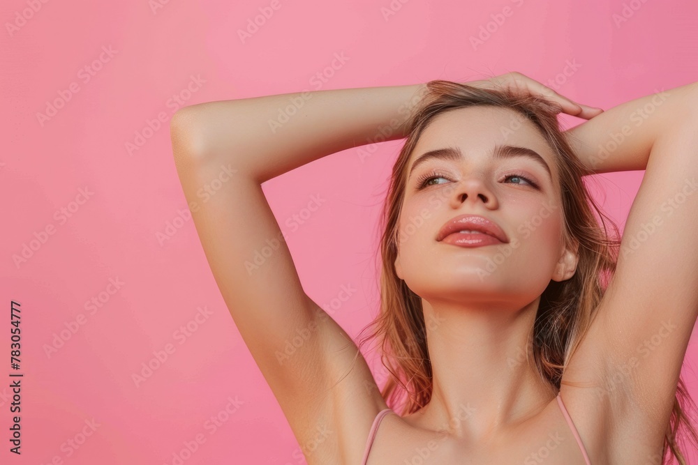 Obraz premium Smooth Clean Armpit: Laser Hair Removal Procedure For Active Lifestyle. Closeup of Young Woman Showing Hair-Free Armpit with Antiperspirant Scent on Pink Background