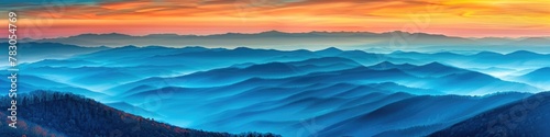 Smoky Mountain Sunset: Captivating Blue and Orange Sky with Foggy Ridges in Great Smoky Mountains photo