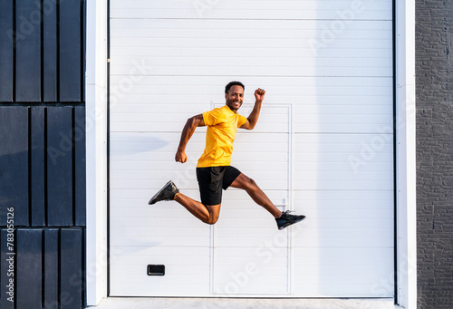 Handsome athletic african man training outdoors