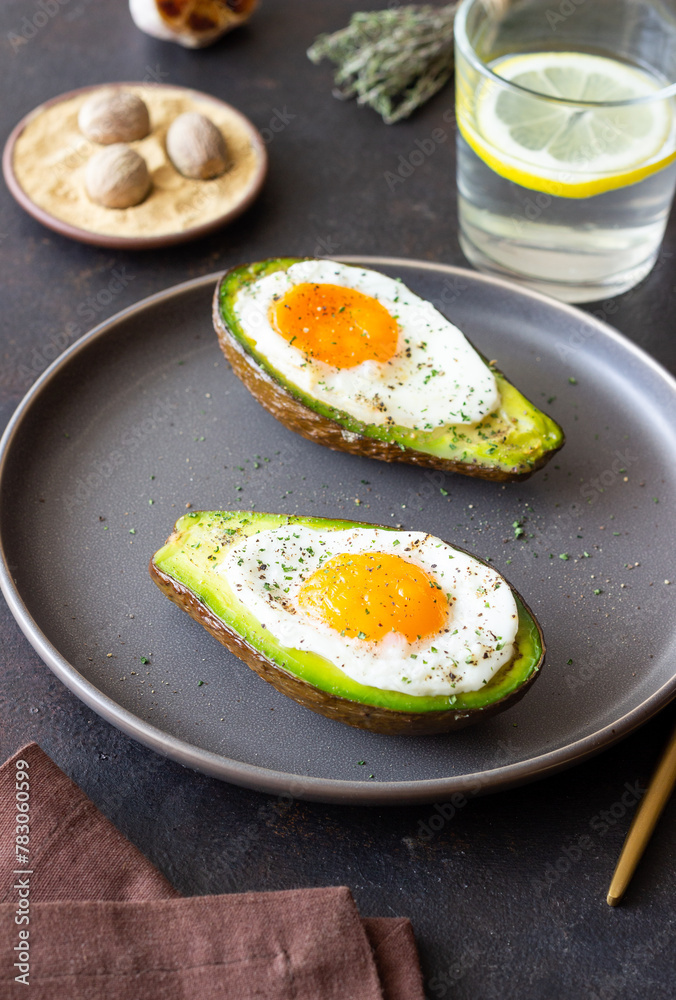 Avocado baked with egg. Healthy eating. Diet. Avocado baked with egg. Healthy eating. Diet.