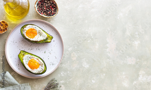 Avocado baked with egg. Healthy eating. Diet.