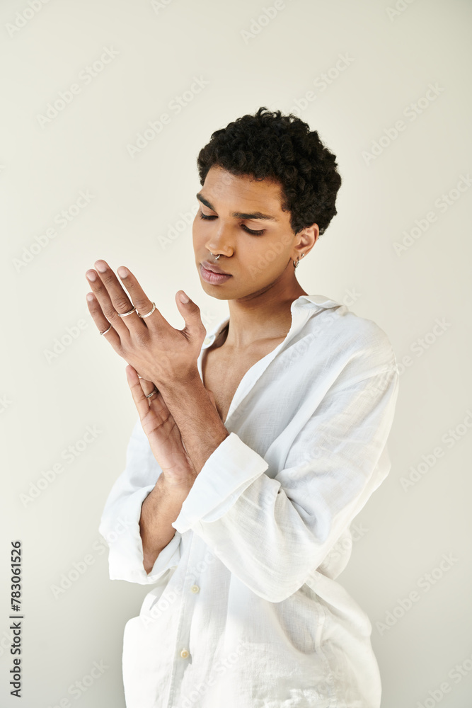 good looking elegant african american man in chic linen clothing looking away on beige backdrop good looking elegant african american man in chic linen clothing looking away on beige backdrop