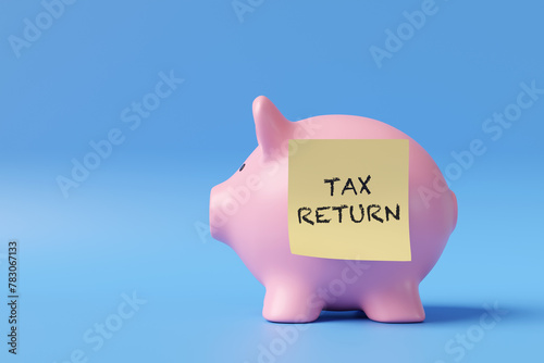 Yellow sticky note having the words TAX RETURN sticking on a pink piggy bank in blue background. Illustration of the concept of self assessment tax return deadlines photo