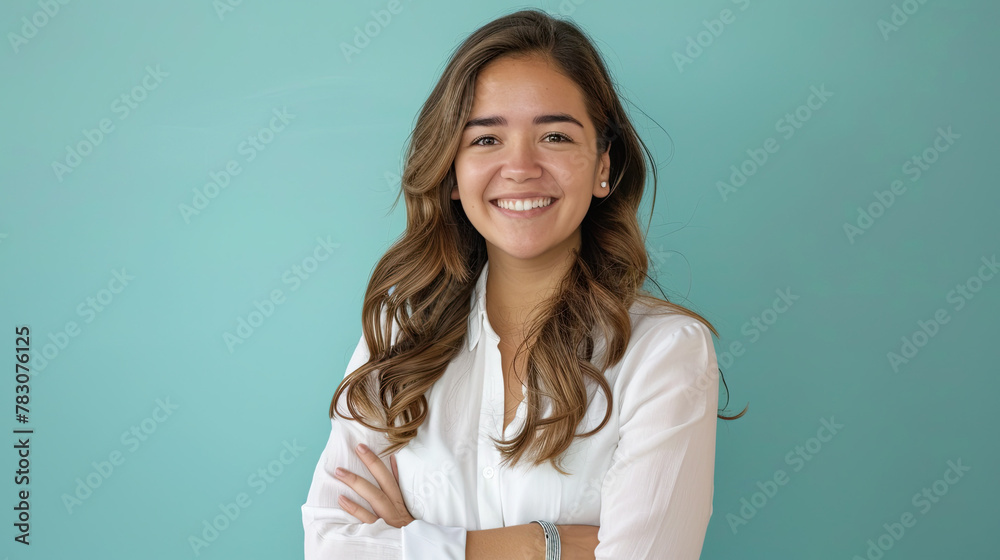 Beautiful successful latin woman smiling on pastel blue background Beautiful successful latin woman smiling on pastel blue background