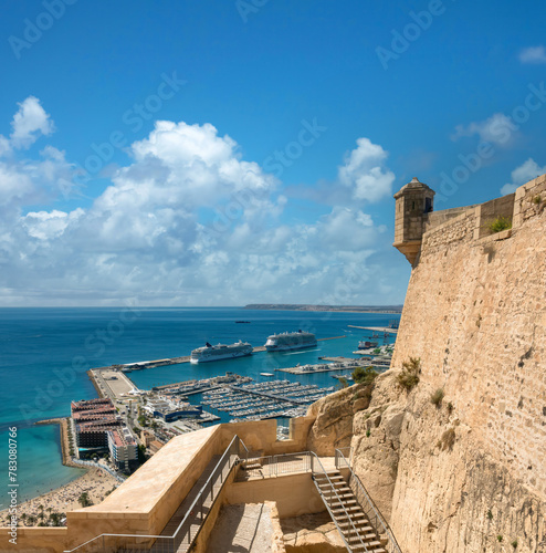 View of the harbor, the marina and Postiguet beach from the Santa Barbara castle ruins, Alicante, Valencia region, Spain photo