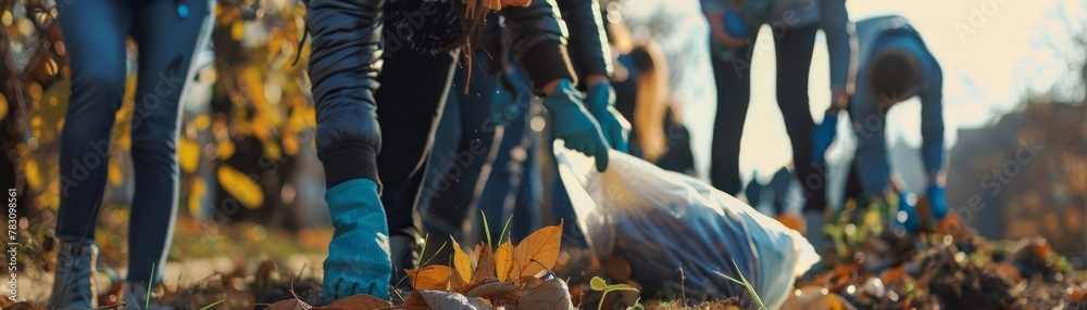 People unite for a cause during a community clean-up, making a positive impact through volunteering efforts. People unite for a cause during a community clean-up, making a positive impact through volunteering efforts.