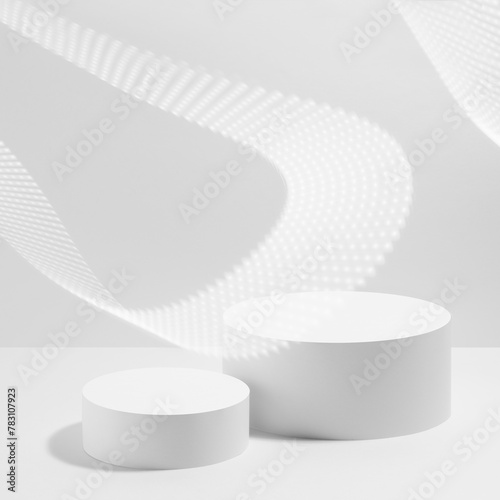 Abstract scene - two round white podiums for cosmetic products mockup, with dotted neon glowing wave on white background. For presentation skin care products, gifts, advertising in minimal style.