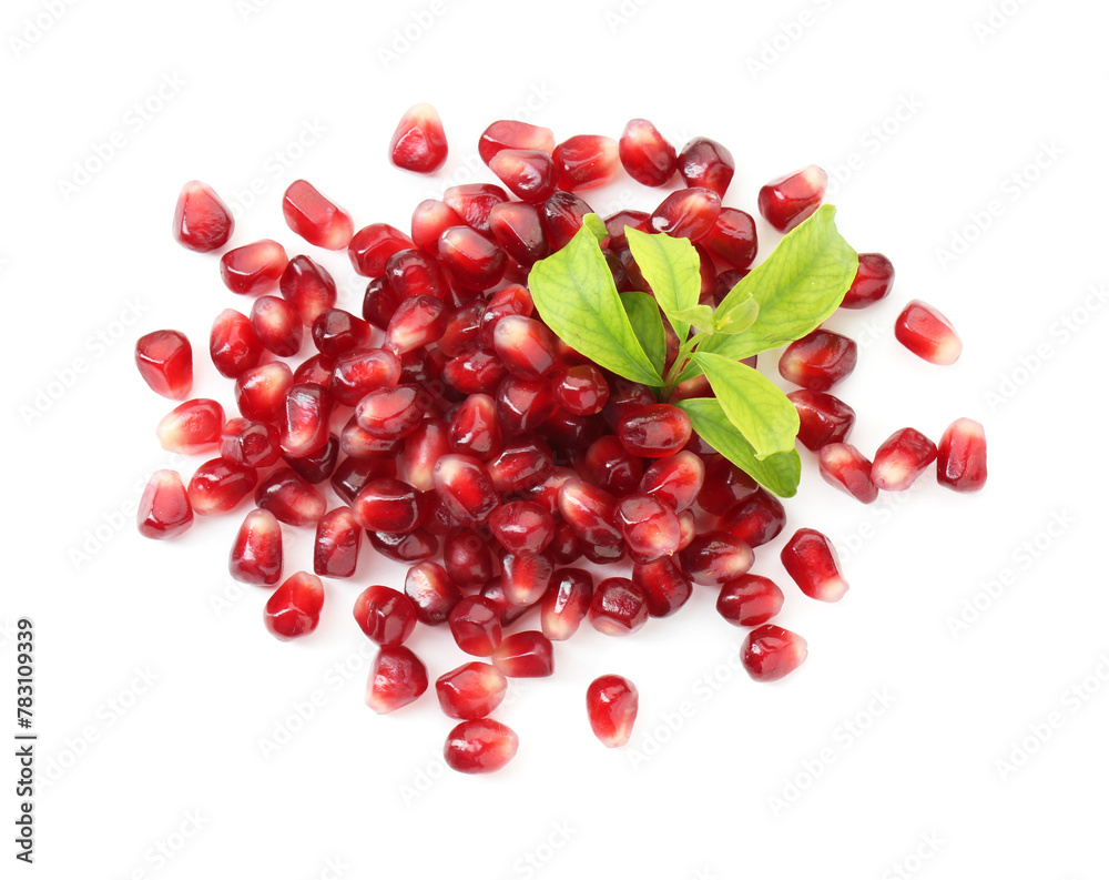 Pile of tasty pomegranate grains and leaves isolated on white, top view